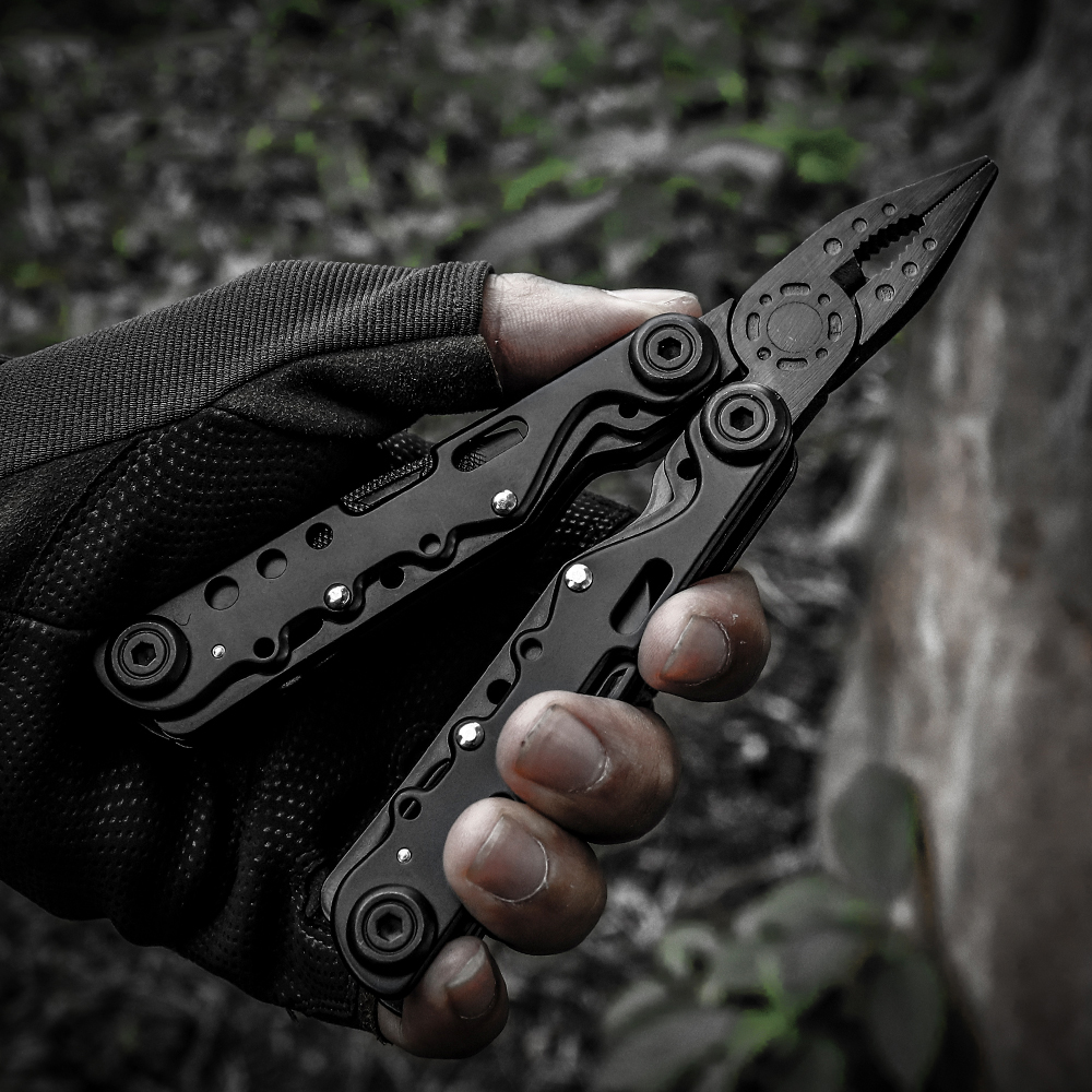 11 in 1 stainless steel multi-tool pliers: being held and used in outdoor scenarios